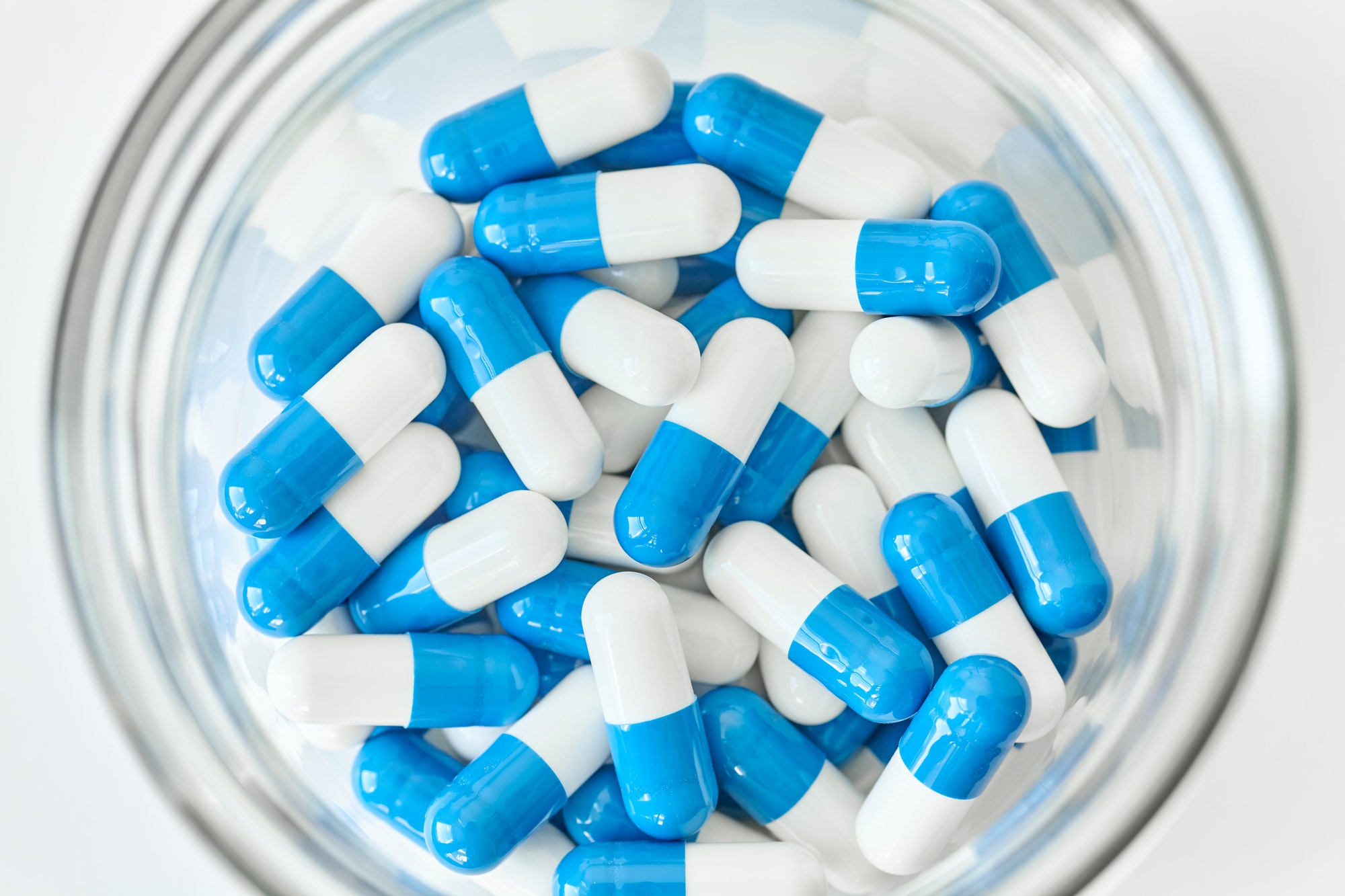 Blue and white capsules